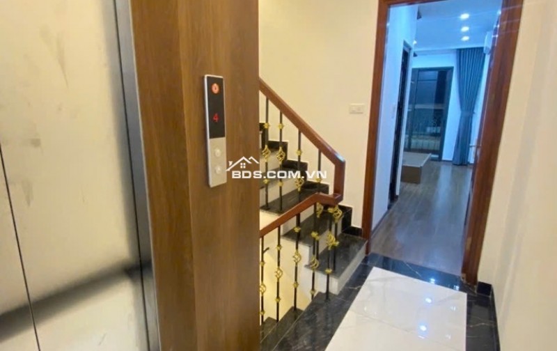 Hoàng Cầu - Đặng Tiến Đông: Nhà 7 tầng, thang máy, ô tô đỗ cửa, 2 thoáng trước - sau, chỉ 13.7tỷ